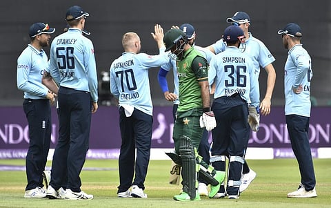 Pakistan's Fakhar Zaman returns to the pavillion after being dismissed during the first one day international cricket match between England and Pakistan at Sophia Gardens in Cardiff.