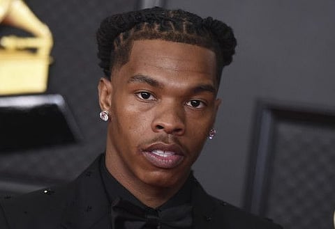 Lil Baby poses in the press room at the 63rd annual Grammy Awards at the Los Angeles Convention Center on Sunday, March 14, 2021.