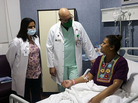 Sonali Gupta with the doctors at Bareen International Hospital in Abu Dhabi.
