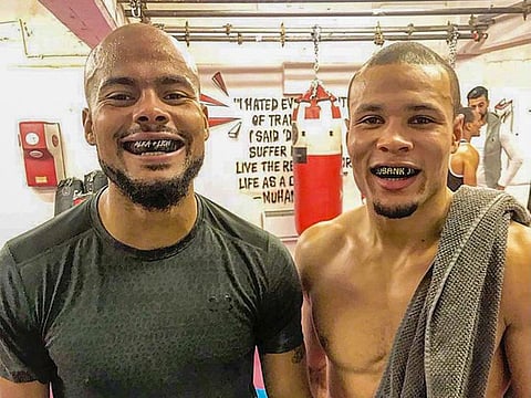 Sebastian Eubank, left, with his older brother Chris 