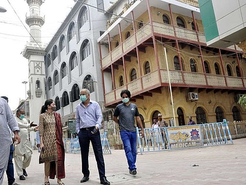 MPA of Pakistan People's Party, Sharmila Farooqi, inspects development work in Kharadar area of Karachi along with civic officials. Wazir Mansion, the birthplace of Quaid-e-Azam, in seen in the background. 