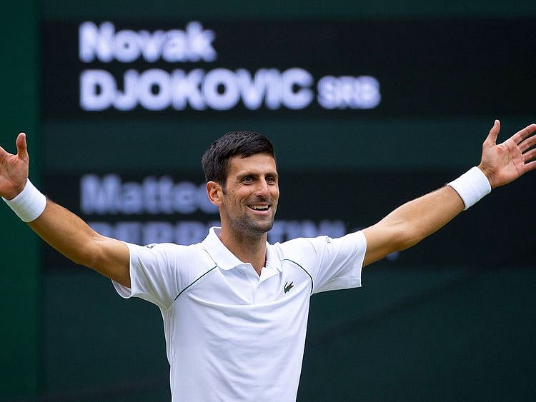 Novak Djokovic celebrates after defeating Italy's Matteo Berrettini to claim the Wimbledon title