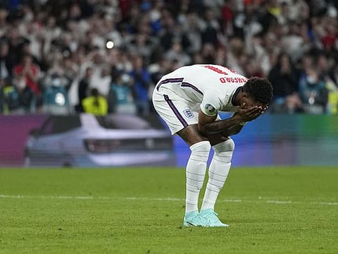 England's forward Marcus Rashford reacts after missing his penalty against Italy in the Euro 2020 final. 