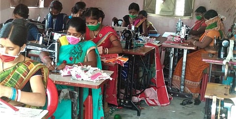 Rural women stitching facemasks in Bihar. 