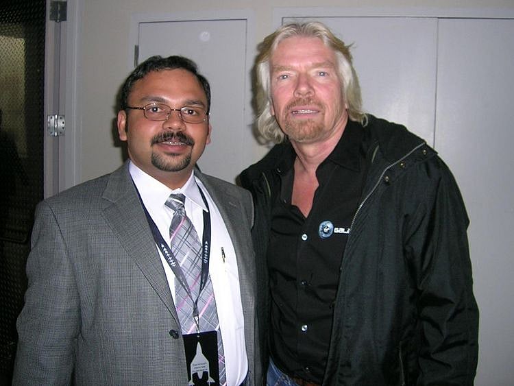 Santhosh George Kulangara (left) with Richard Branson, the founder of the Virgin Group. 