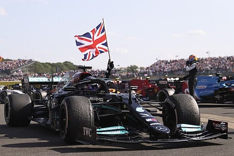 Mercedes driver Lewis Hamilton of Britain celebrates after winning the British Formula One Grand Prix, at the Silverstone circuit, in Silverstone, England.