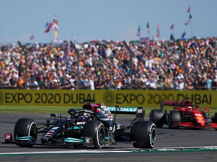 Mercedes driver Lewis Hamilton takes the win over of Ferrari's Charles Leclerc a