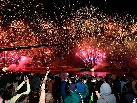 People celebrate in Brisbane following an announcement by the International Olympic Committee that Brisbane was picked to host the 2032 Olympics. 