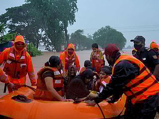 Photos: Scores killed in India landslides while floods trap more 
