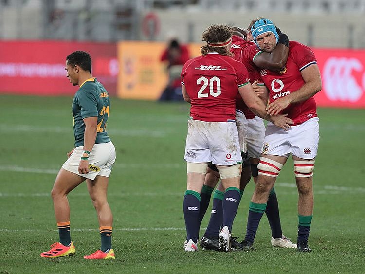British & Irish Lions' Hamish Watson with teammates Tadhg Beirne and Maro Itoje celebrate after defeating South Africa in the first Test
