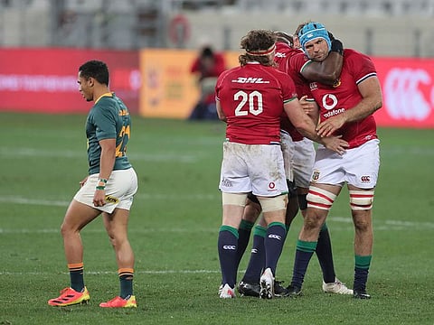 British & Irish Lions' Hamish Watson with teammates Tadhg Beirne and Maro Itoje celebrate after defeating South Africa in the first Test 
