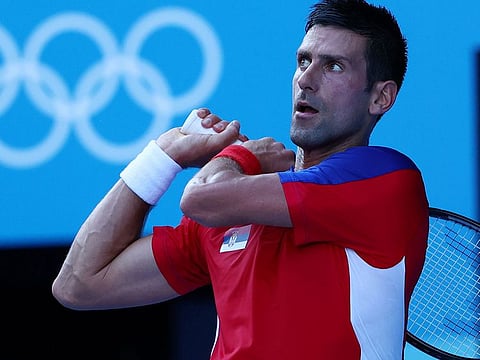 Novak Djokovic of Serbia in action during his first-round match against Hugo Dellien 