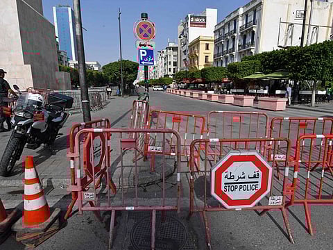 Tunisian police barricade the Habib Bourguiba avenue in Tunis on July 27, 2021. Tunisia, the birthplace of the Arab Spring revolts a decade ago and long seen as its sole democratic success story, was plunged into constitutional crisis this week. 