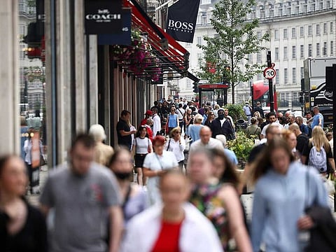 People walk along Regent Street, amid the coronavirus disease (COVID-19) outbreak, in London, Britain