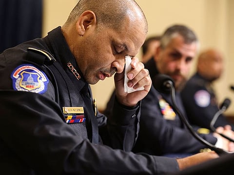 U.S. Capitol Police Sgt. Aquilino Gonell pauses during his testimony at the first hearing of the select committee investigating the deadly storming of the Capitol in Washington on Tuesday, July 27, 2021.