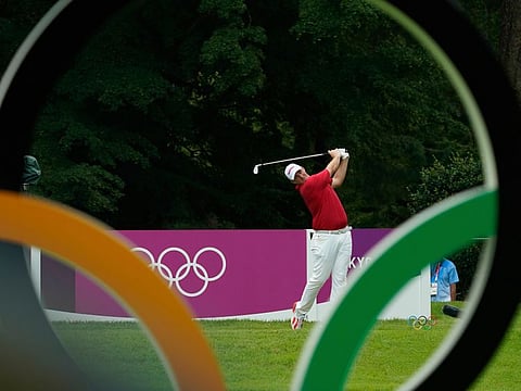 Austria's Sepp Straka, early leader after first round, hits a tee shot on the 16th hole at the Kasumigaseki Country Club in Kawagoe, Japan. 