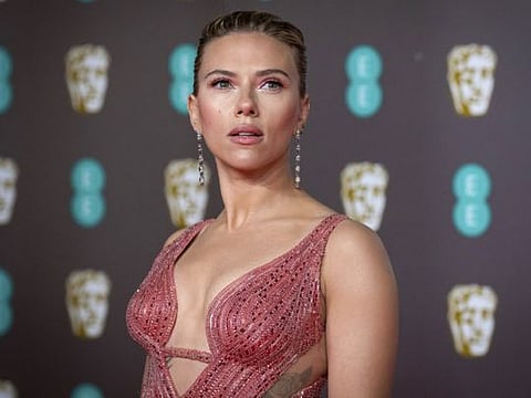 Scarlett Johansson arrives at the Bafta Film Awards, in central London, Feb. 2 2020.