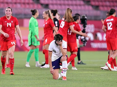 Carli Lloyd of the United States looks dejected after the loss to Canada 