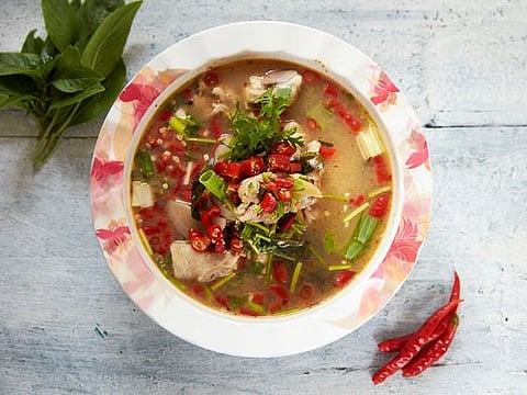 Spicy chicken bone soup recipe from Chef New's childhood, recreated in Dubai 