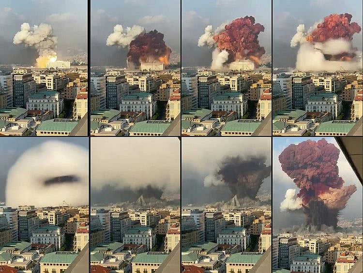 In this file combination of pictures created on August 05, 2020 UGC footage filmed from an office building shows a fireball exploding while smoke is billowing during a chemical explosion at the port of the Lebanese capital Beirut the previous day. 