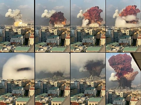 In this file combination of pictures created on August 05, 2020 UGC footage filmed from an office building shows a fireball exploding while smoke is billowing during a chemical explosion at the port of the Lebanese capital Beirut the previous day. 