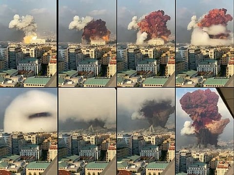 In this file combination of pictures created on August 05, 2020 UGC footage filmed from an office building shows a fireball exploding while smoke is billowing during a chemical explosion at the port of the Lebanese capital Beirut the previous day. 
