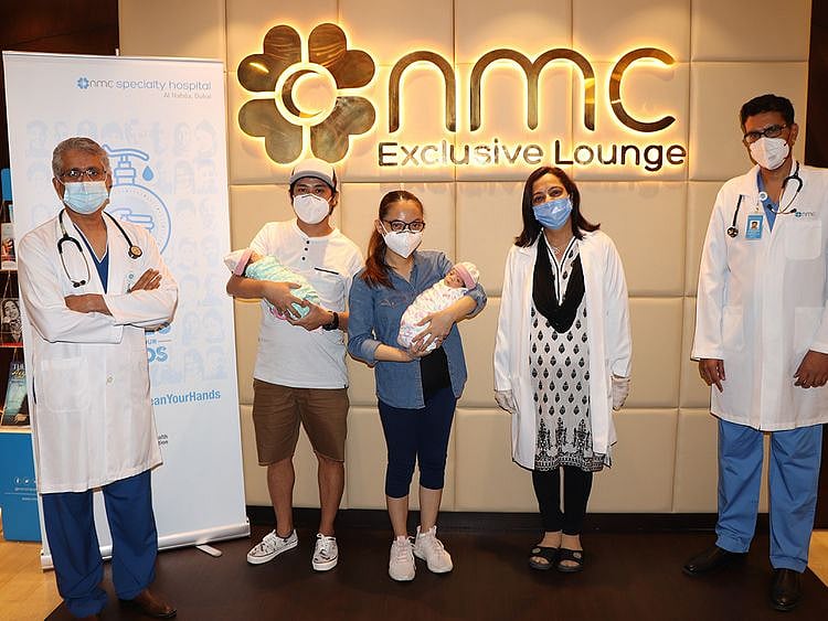 Mariecen Agillon and husband with their twins-1628053570249