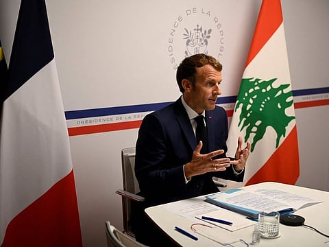 France's President Emmanuel Macron gestures as he attends the Lebanon donors' conference, gathering online representatives of international institutions and heads of state, one year after Beirut port blast, at the Fort de Bregancon, in Bormes-Les-Mimosas, southern France, on August 4, 2021.  