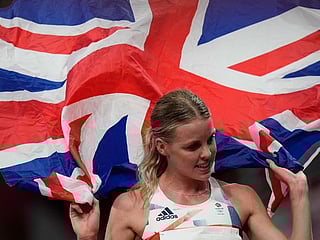 Photos: Olympians proudly display their national flags