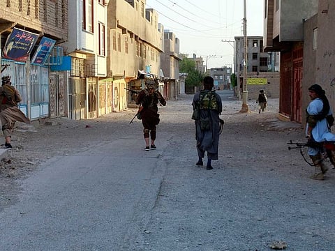 Private militia loyal to Ismail Khan, the former Mujahideen commander, patrols after security forces took back control of parts of Herat city following fighting between Taliban and Afghan security forces in Herat province, west of Kabul, Afghanistan, Friday, Aug. 6, 2021.