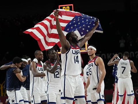 United States' players celebrate after their win in the men's basketball gold medal game against France at the 2020 Summer Olympics in Saitama, Japan.