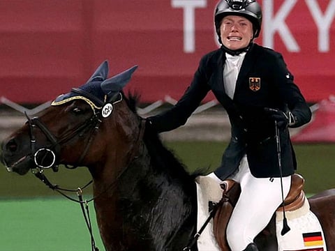 Hold your horses! Annika Schleu of Germany struggles on board Saint Boy in the modern pentathlon.