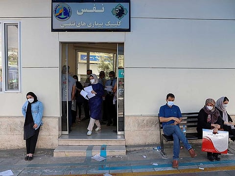 Iranians wait outside a coronavirus disease (COVID-19) testing centre as (COVID-19) cases spike, in Tehran, Iran, July 28, 2021. 