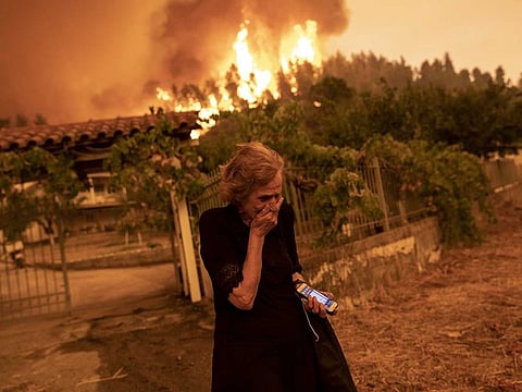 Greece wild fire.  A sense of urgency has intensified on climate change with the breakout of devastating forest fires in the US and elsewhere this summer.
