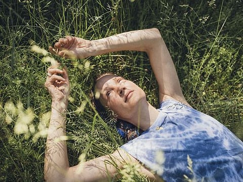Vicky Krieps in the backyard of her family home in rural Luxembourg on June 19, 2021.
