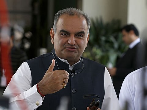 Ramesh Kumar Vankwani, a Pakistani lawmaker and leader of Hindu community talks to media after the hearing of Hindu temple case, in Islamabad, on August 6, 2021.  Vankwani, who is the patron-in-chief of the Pakistan Hindu Council, condemned the attack on Hindu temple, saying such incidents bring disrespect to the country.
