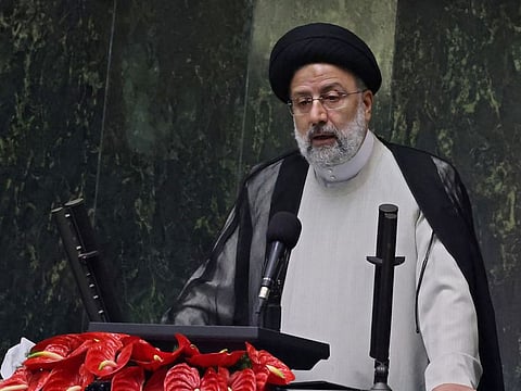 Iran's newly elected President Ebrahim Raisi speaks during his swearing in ceremony at the Iranian parliament in the capital Tehran on August 5, 2021.  Raisi presented his cabinet to parliament for a vote of confidence on Wednesday. 