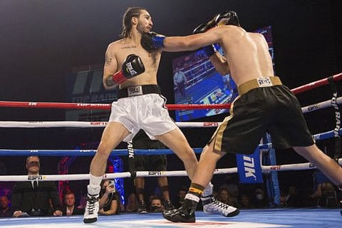 Nico Ali Walsh (left) fights Jordan Weeks during their Middleweight fight at the Hard Rock Casino Theater in Catoosa.