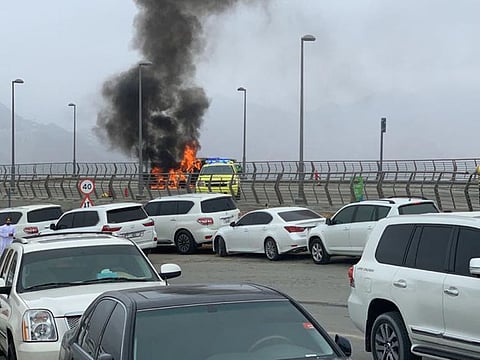 The car in flames in Khor Fakkan on Tuesday. Civil Defence controlled the blaze within minutes. 