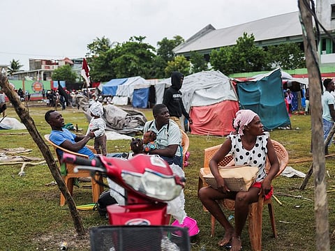 Residents who were evacuated from their damaged homes are seen at a stadium used as shelter after Saturday's 7.2 magnitude quake, in Les Cayes, Haiti August 17, 2021.