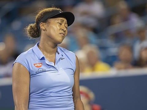 World number two Naomi Osaka suffered a surprise third-round defeat to Swiss wildcard Jil Teichmann at the Cincinnati Masters.