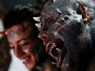 'The sinister attracted me': Brazilian tattoo artist morphs into devil look-alike 