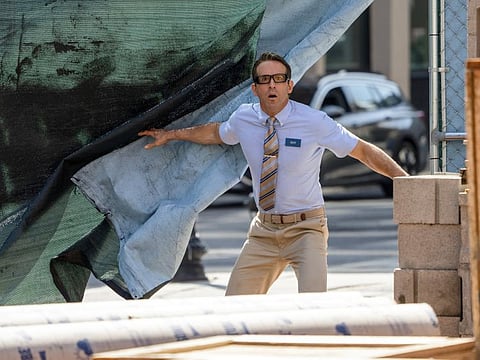 Ryan Reynolds as Guy in 20th Century Studios’ FREE GUY. Photo by Alan Markfield. © 2020 Twentieth Century Fox Film Corporation.  All Rights Reserved.