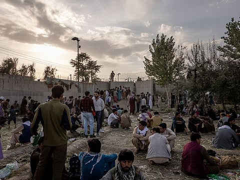 American soldiers guard an entrance to the Hamid Karzai International Airport in Kabul, Afghanistan.