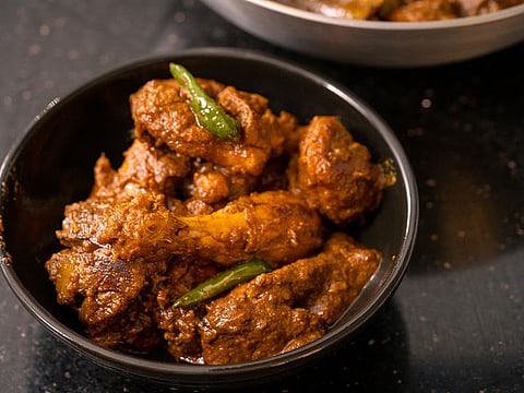 A gravy-based chicken recipe cooked in mild spices 