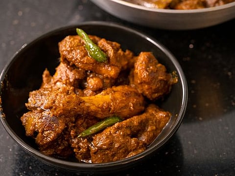 A gravy-based chicken recipe cooked in mild spices 