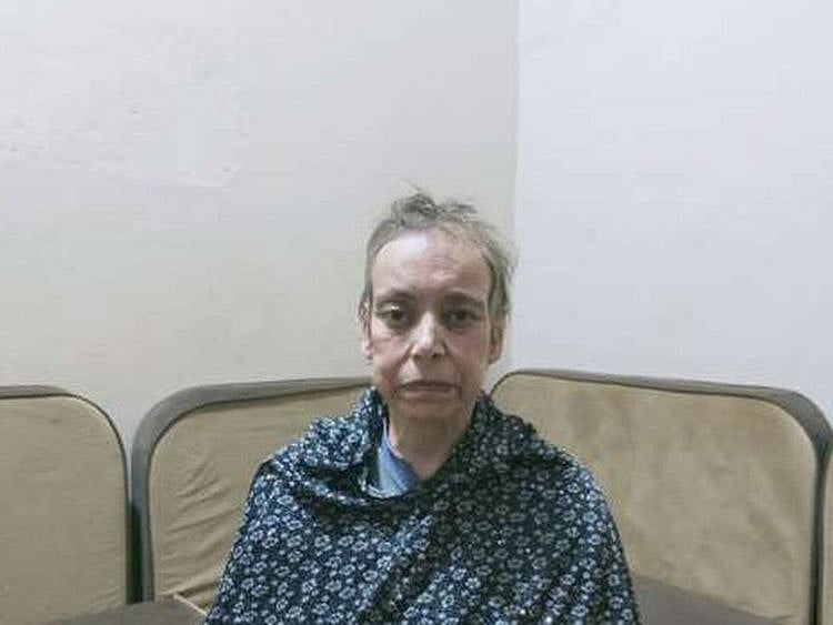  The woman appeared in an online video with her hair drastically cut and levelled the accusation against her son.