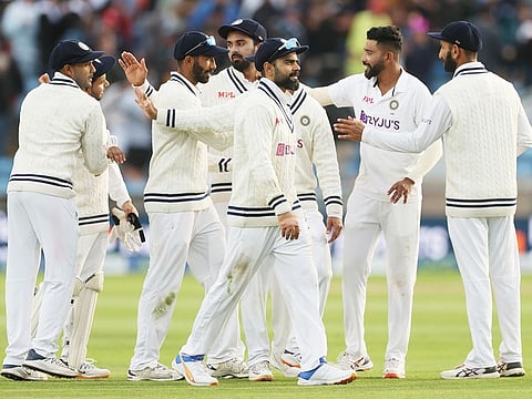 India's Virat Kohli with teammates at the end of the second day of the 3rd Test against England, at Headingley, Leeds, on August 26, 2021. 