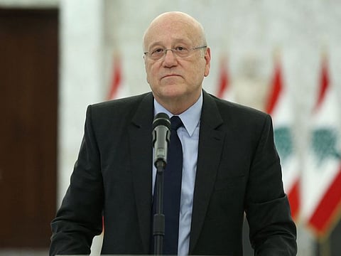 Lebanon's premier-designate Najib Mikati holding a press conference following his meeting with the president at the presidential palace in Baabda, east of the capital Beirut, on August 26, 2021.  