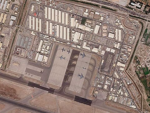 This satellite photo provided by Planet Labs Inc. shows the military side of Kabul International Airport, also known as Hamid Karzai International Airport, Tuesday Aug. 17, 2021.